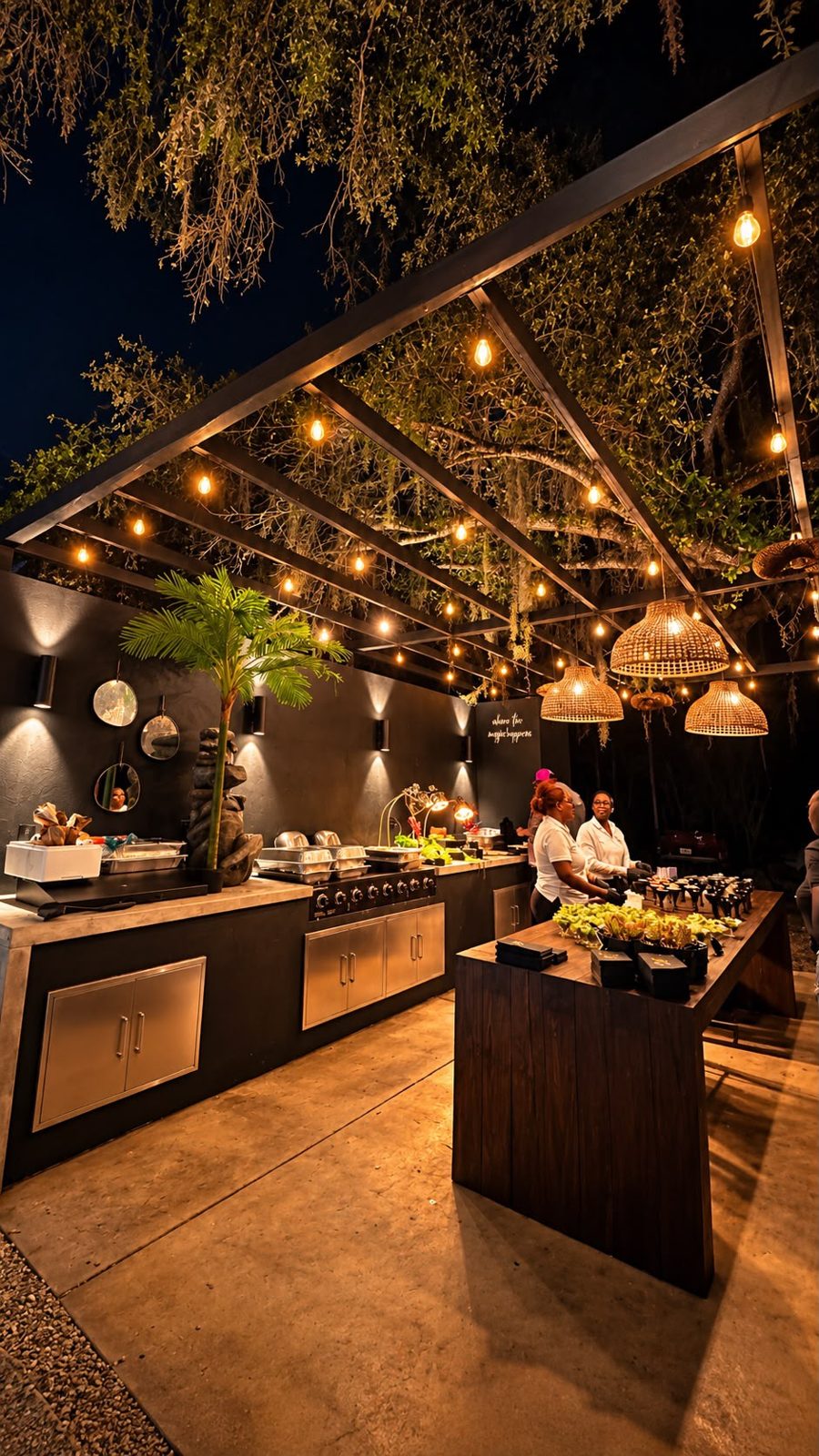 Our chef’s outdoor kitchen with work counters, a large barbecue and warm lighting for catering at CAL Events Cooper City